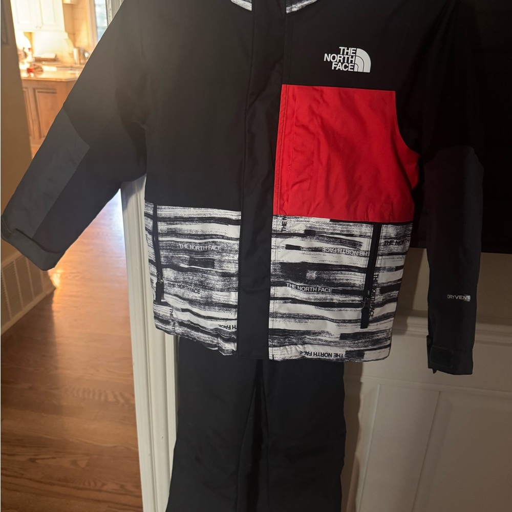 The North Face Kids' Black and Red Jacket with Pattern